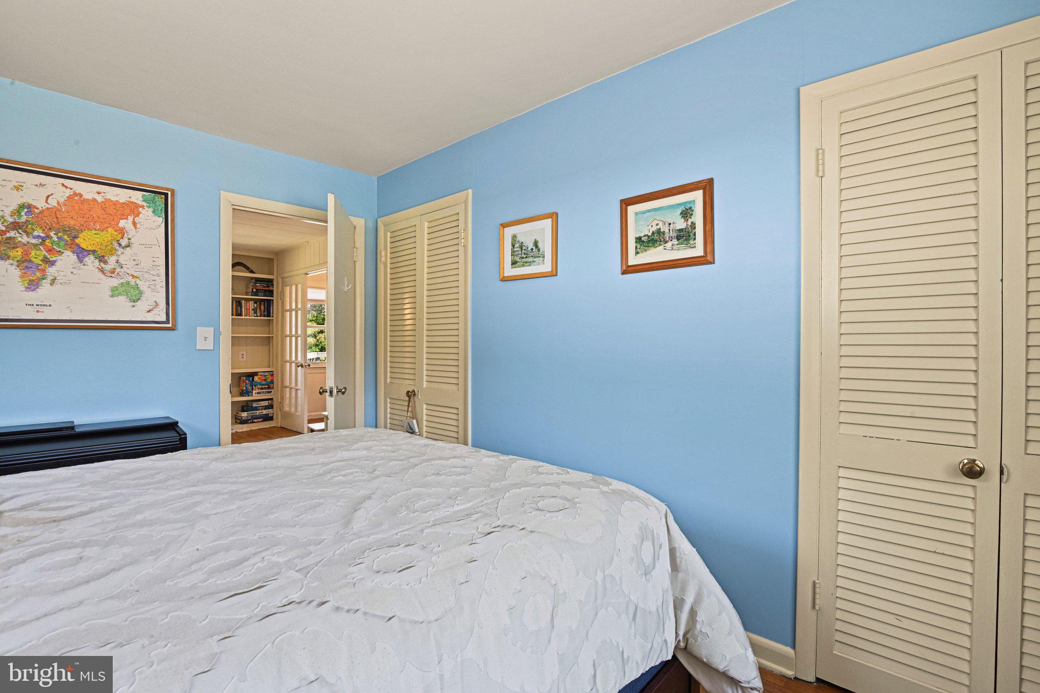 909 Plum Street Southwest Vienna, VA 22180 - Photo 17 of 38 a bedroom with a large bed and a window