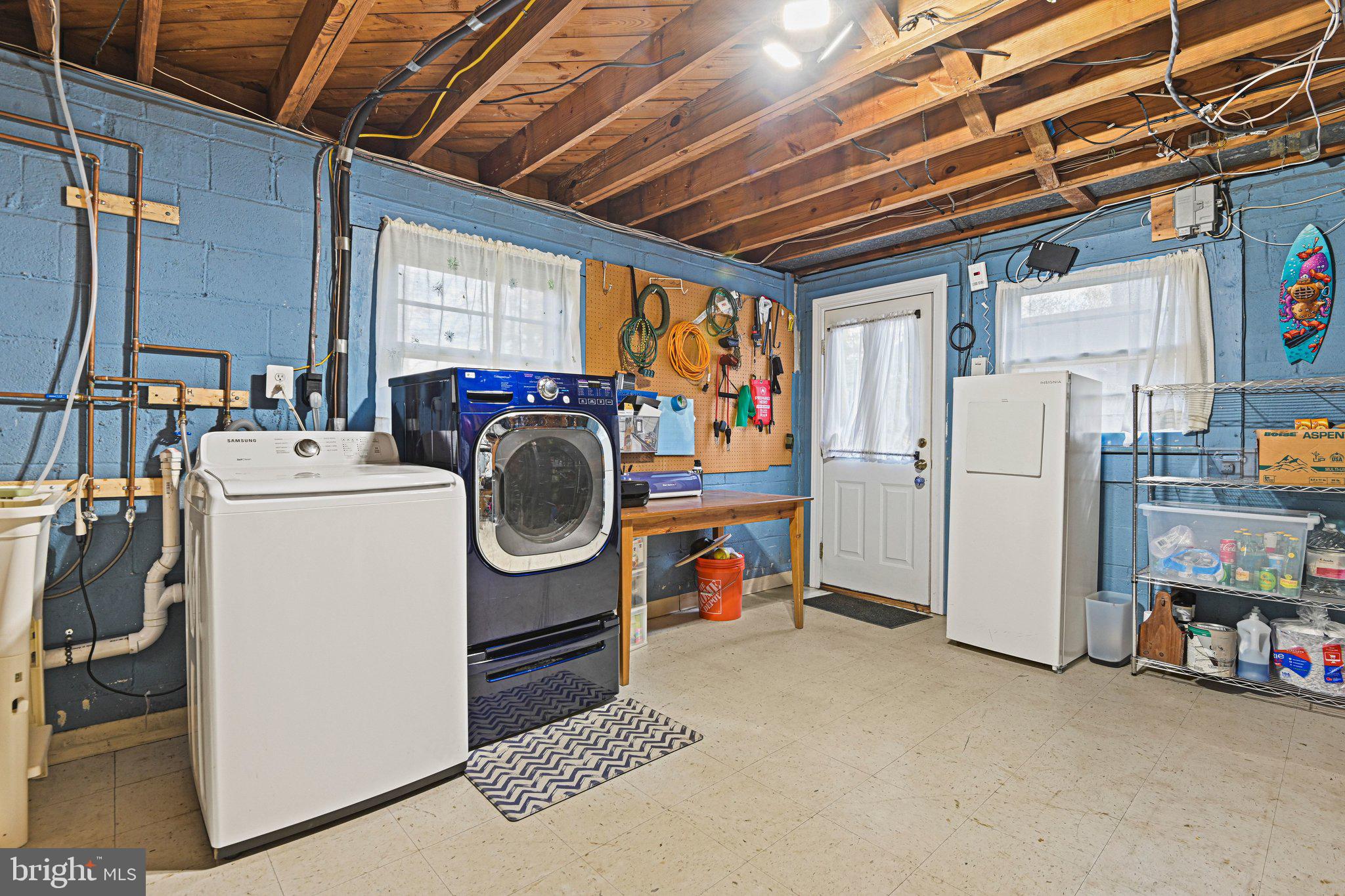 909 Plum Street Southwest Vienna, VA 22180 - Photo 28 of 38 a utility room with dryer and washer
