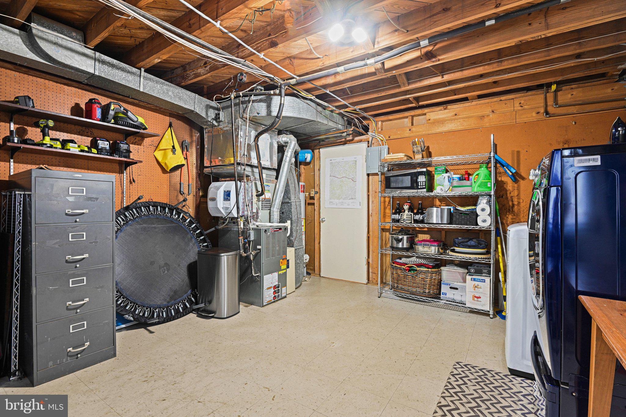 909 Plum Street Southwest Vienna, VA 22180 - Photo 29 of 38 a view of storage and utility room