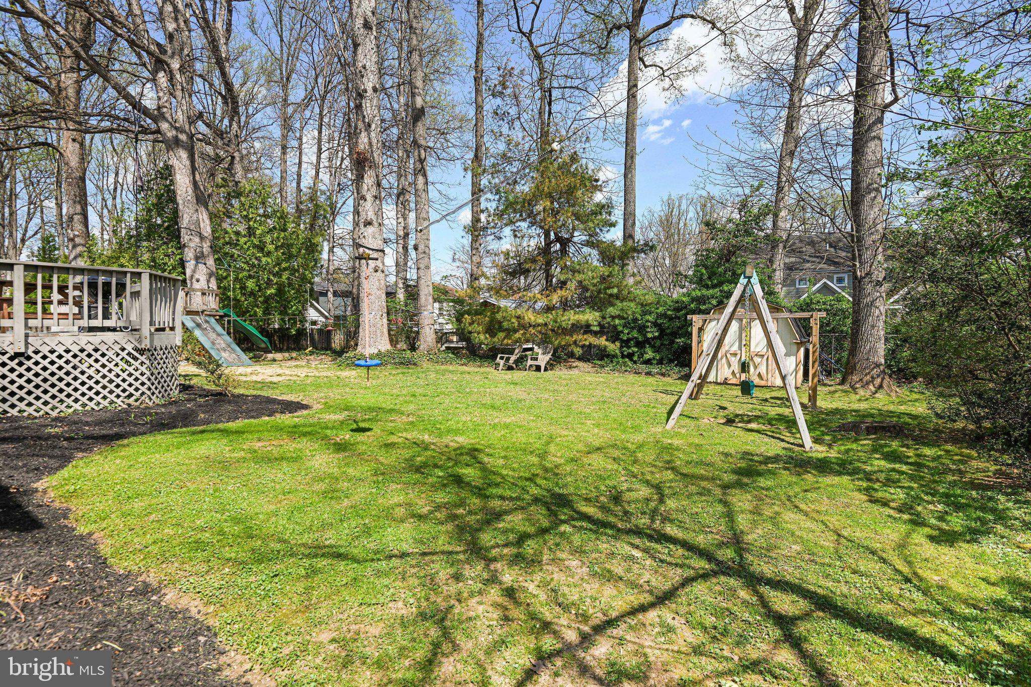 909 Plum Street Southwest Vienna, VA 22180 - Photo 38 of 38 a view of a backyard with a slide