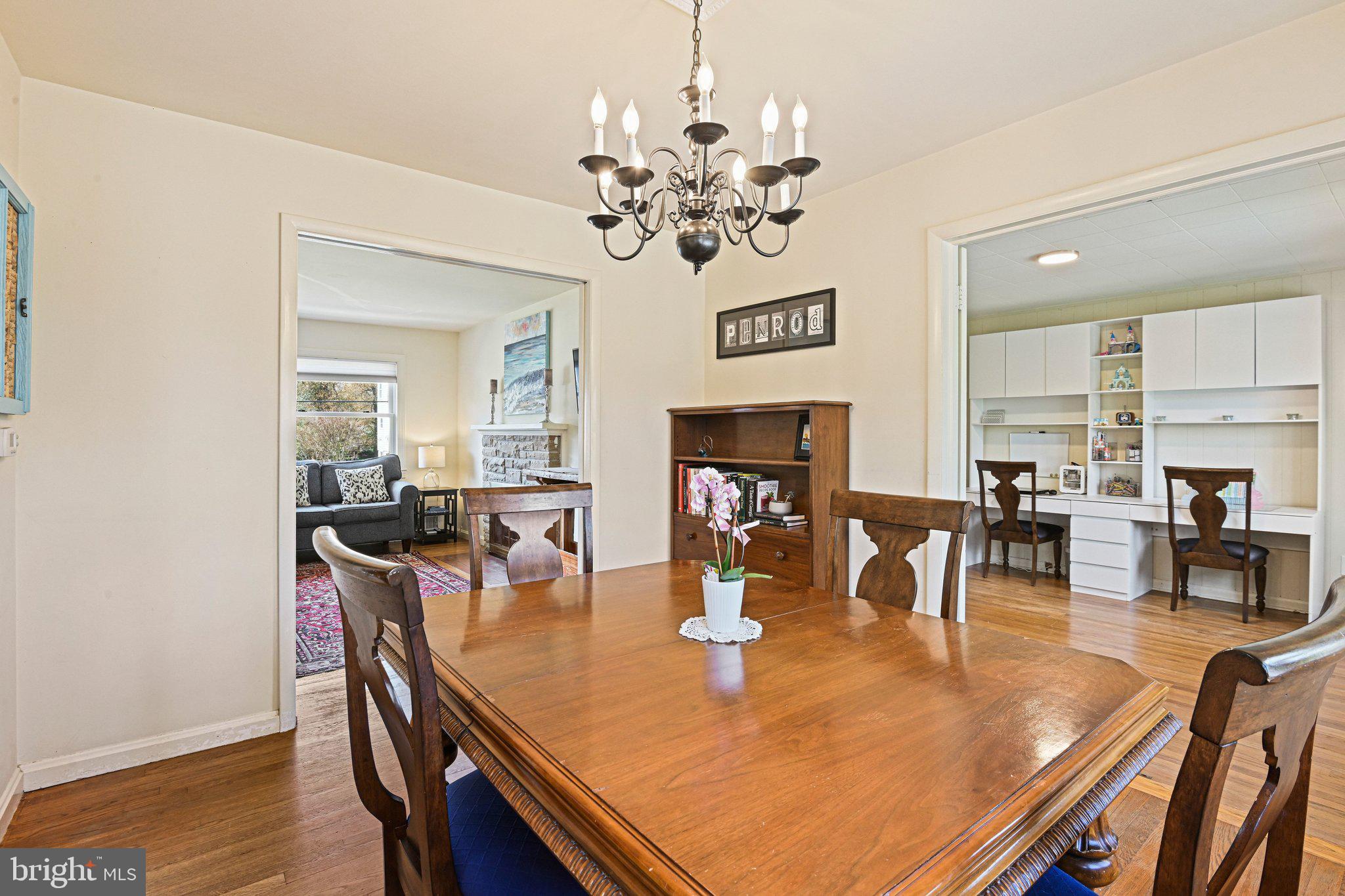 909 Plum Street Southwest Vienna, VA 22180 - Photo 6 of 38 a view of a dining room with furniture and wooden floor