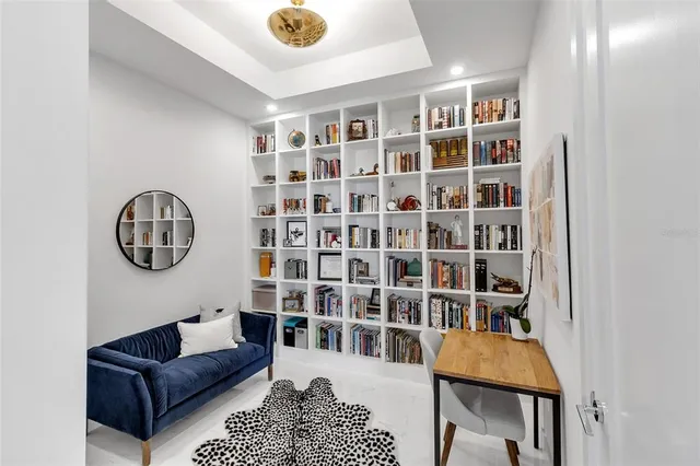 a workspace with a book shelf