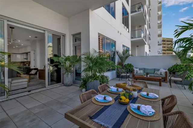 a potted plant sitting on the side of a building