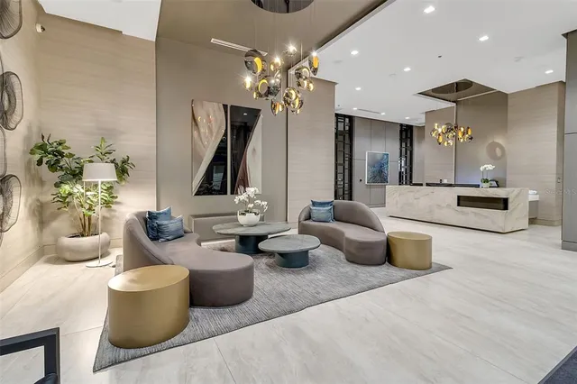 a living room with lots of furniture and a flat screen tv