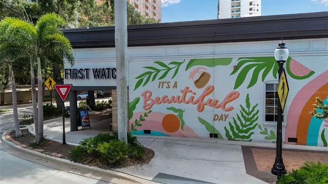 a view of a city with tall buildings