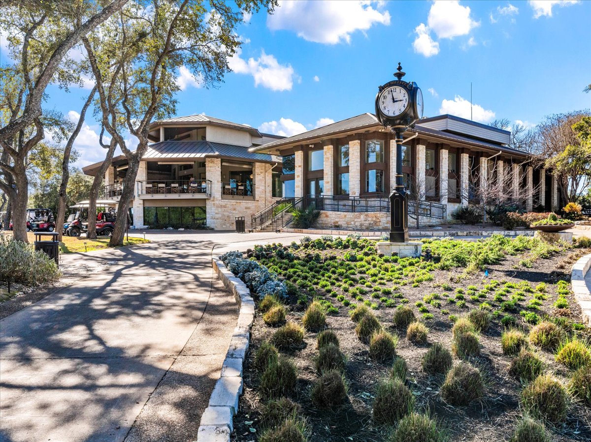 58 Cottondale Road The Hills, TX 78738 - Photo 38 of 40 a front view of a building with a yard