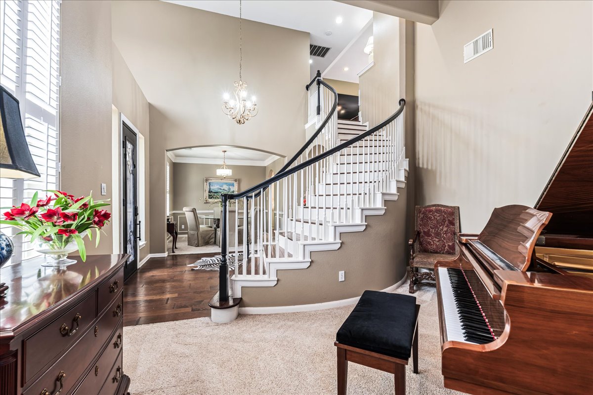 58 Cottondale Road The Hills, TX 78738 - Photo 4 of 40 a view of entryway and hall with wooden floor
