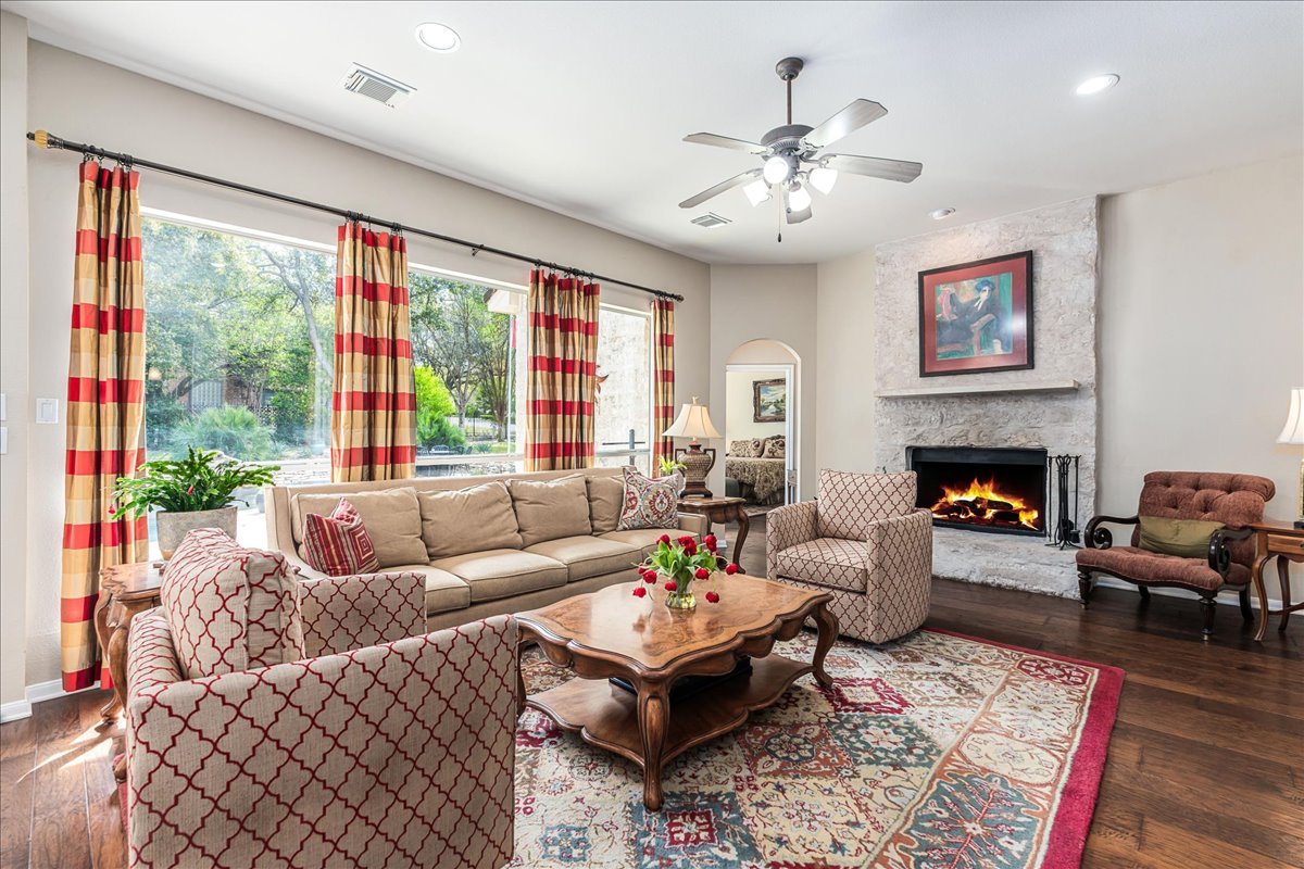 58 Cottondale Road The Hills, TX 78738 - Photo 7 of 40 a living room with furniture and a large window