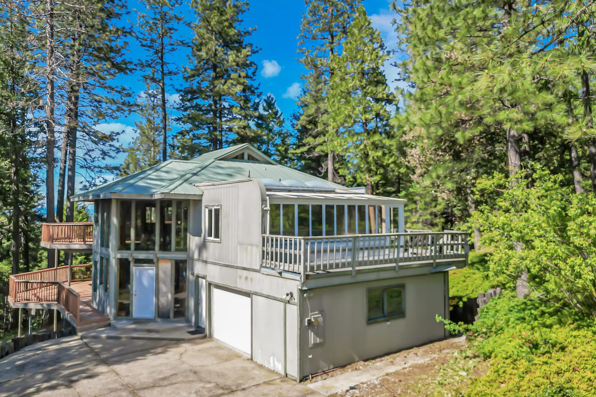 15368 Star Flower Road Oak Run, CA 96069 - Photo 2 of 63 a house view with a garden space