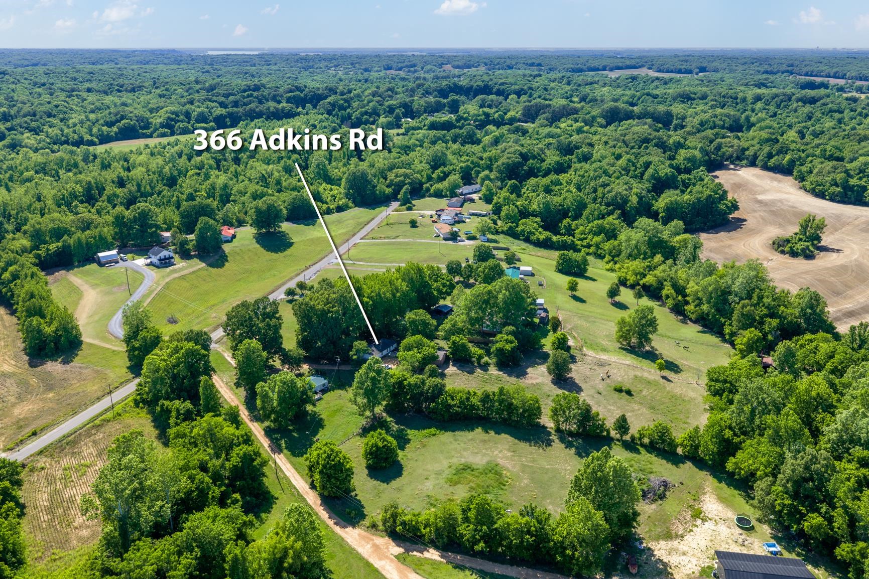 366 Adkins Road Burlison, TN 38015 - Photo 19 of 20 Expansive property featuring verdant tree cover and open grassy areas