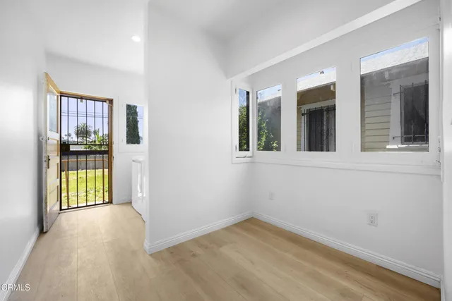 an empty room with windows