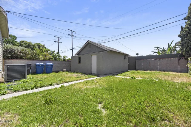 a backyard of a house with lots of green space