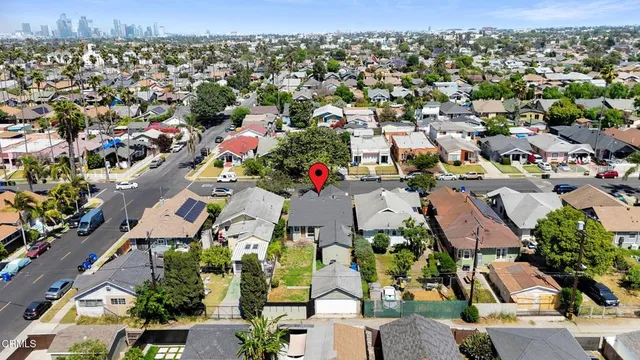 an aerial view of a city with lots of residential buildings