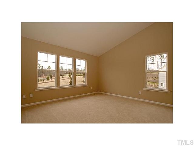 3010 Berkeley Street, Unit 33 Raleigh, NC 27612 - Photo 5 of 12 Master bedroom features vaulted ceilngs, walk in closet and plenty of natural light!!