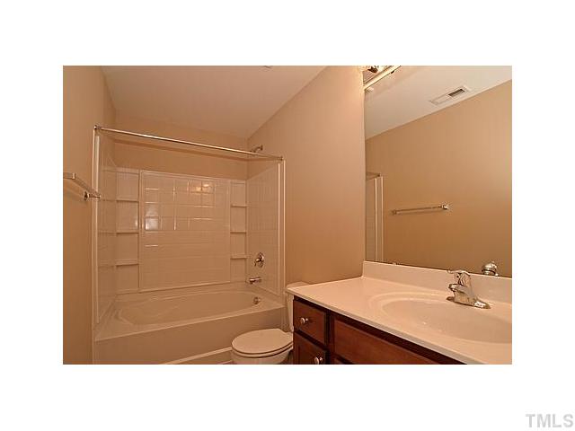 3010 Berkeley Street, Unit 33 Raleigh, NC 27612 - Photo 7 of 12 Beautiful master bath features garden tub with build in shelves! Great couter space as well!