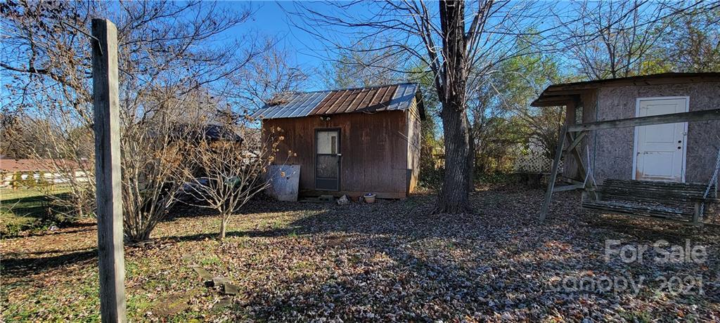 906 Requa Road Cherryville, NC 28021 - Photo 4 of 7 a view of a house with a yard and tree s