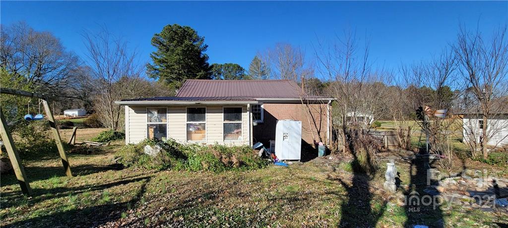 906 Requa Road Cherryville, NC 28021 - Photo 6 of 7 a view of a house with a small yard and plants