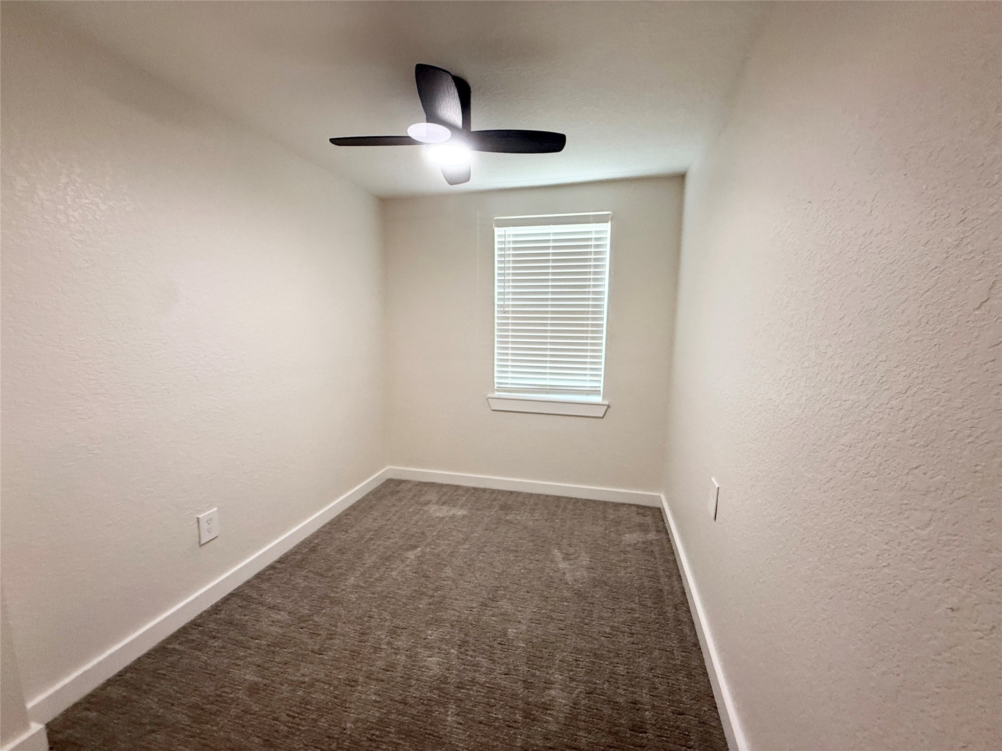 738 Caisson Street Surfside Beach, TX 77541 - Photo 18 of 19 an empty room with windows