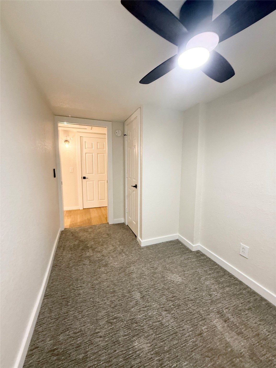 738 Caisson Street Surfside Beach, TX 77541 - Photo 19 of 19 an empty room with ceiling fan and window