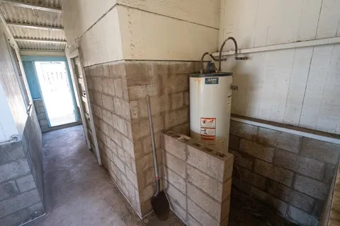 a bathroom with a shower and a sink