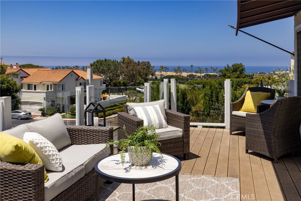 18 Duquesa Dana Point, CA 92629 - Photo 1 of 1 a view of a patio with couches table and chairs