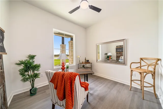 a view of walk in closet with clothes