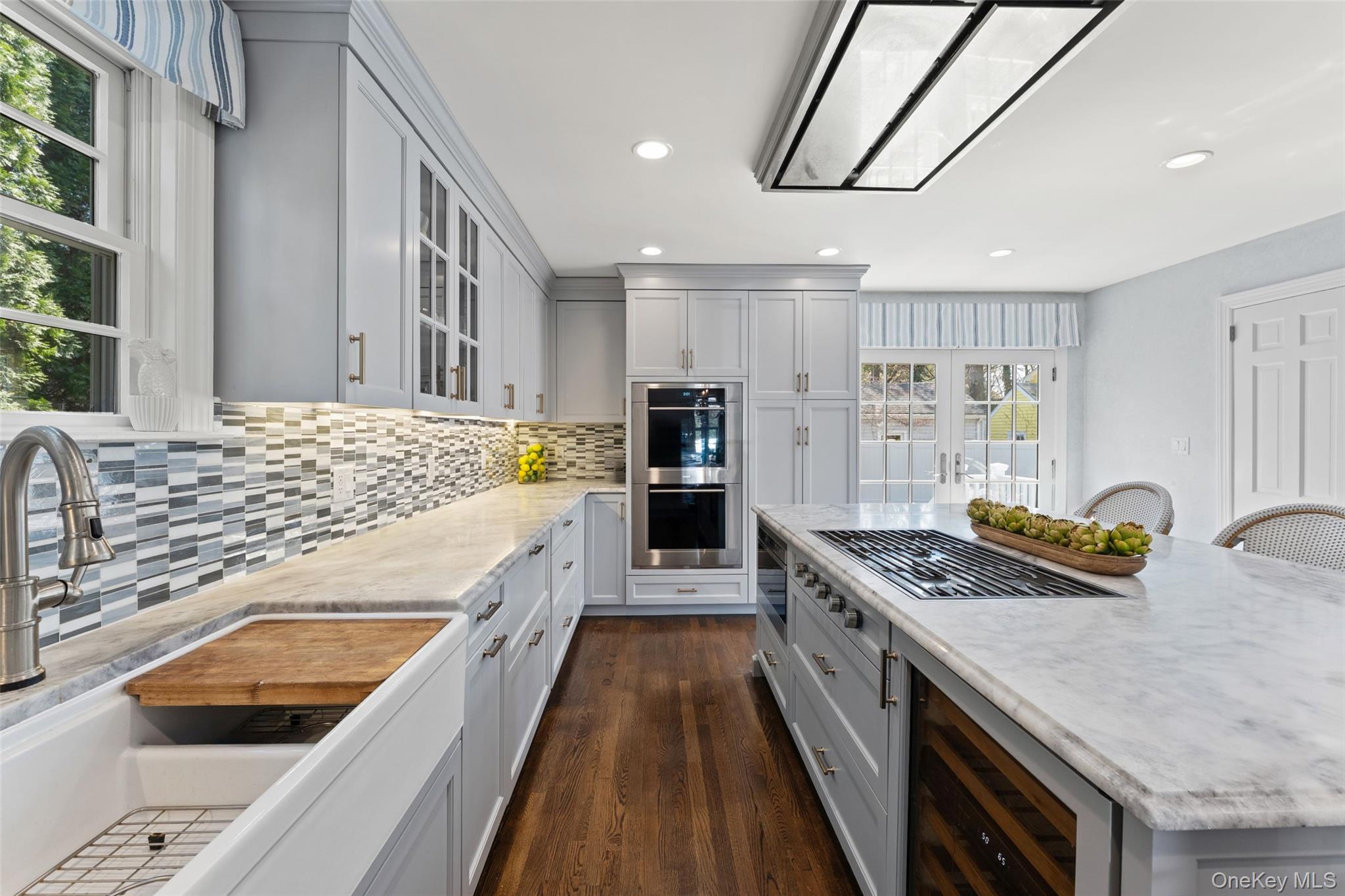 44 Sprague Road Scarsdale, NY 10583 - Photo 11 of 36 Built in wine fridge and microwave drawer in large kitchen island