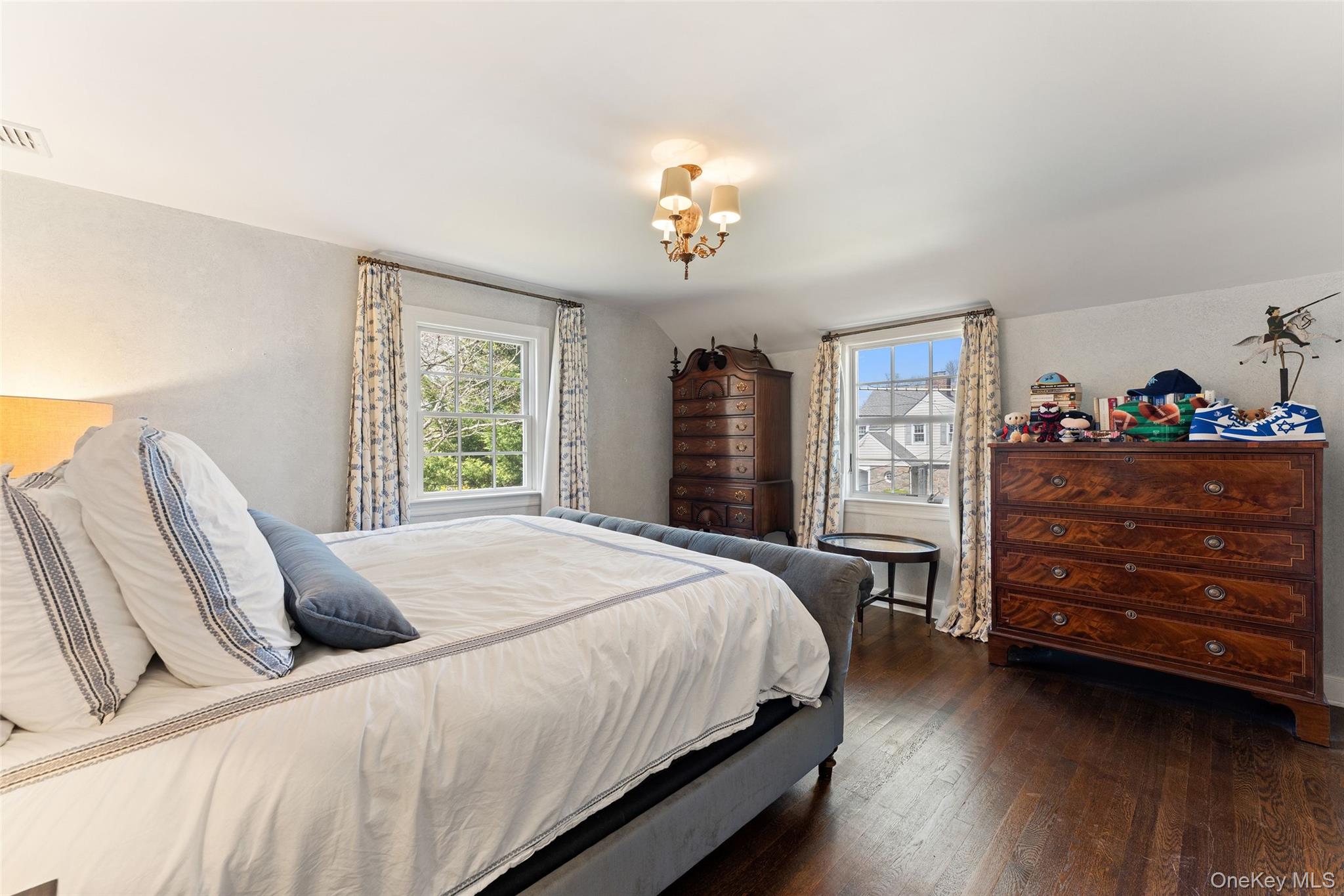 44 Sprague Road Scarsdale, NY 10583 - Photo 17 of 36 Primary suite offers tons of natural light and 2 generous closets, one with custom cabinetry