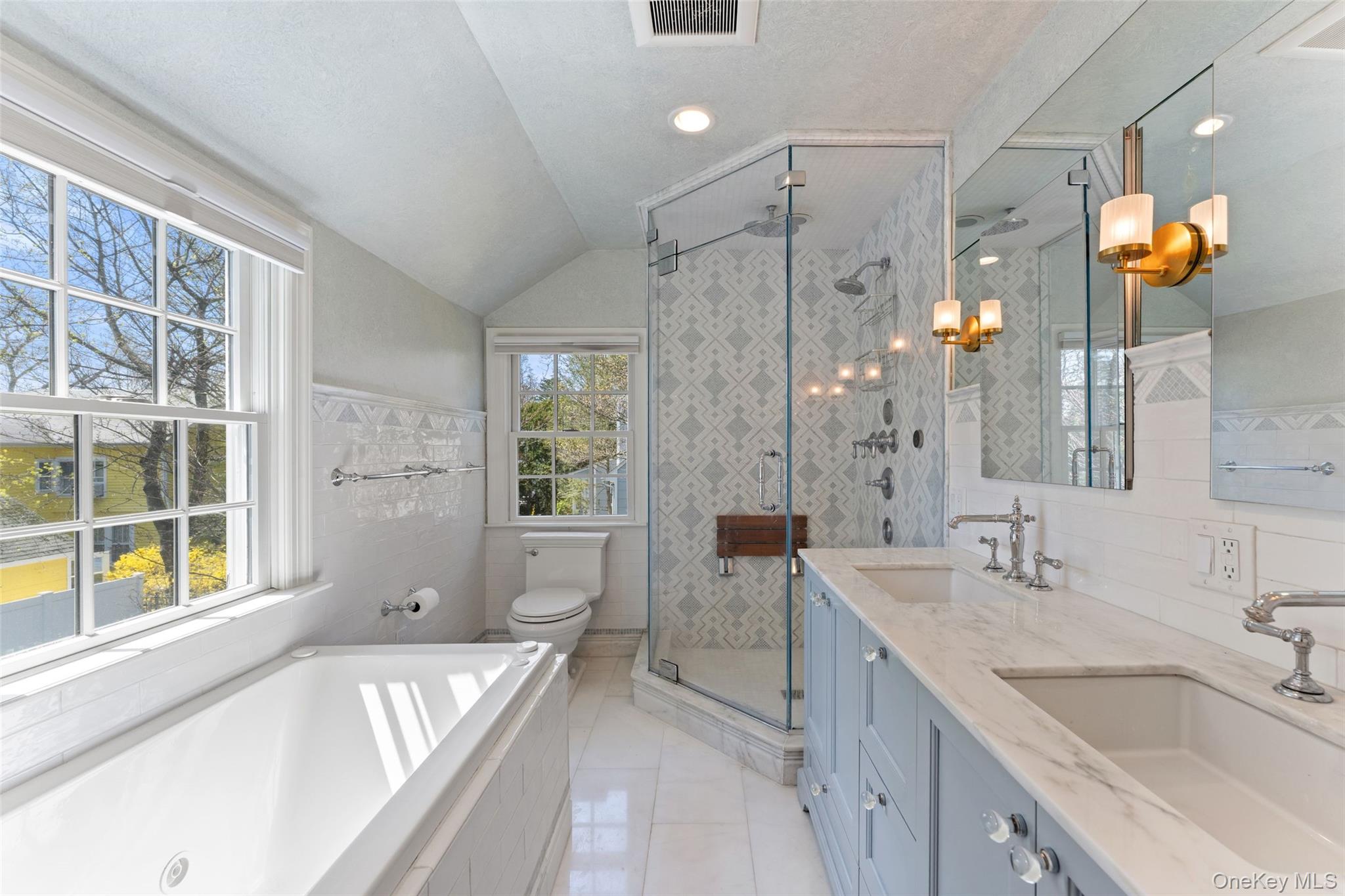 44 Sprague Road Scarsdale, NY 10583 - Photo 18 of 36 Spa-like primary bath with steam shower, radiant floors and soaking tub