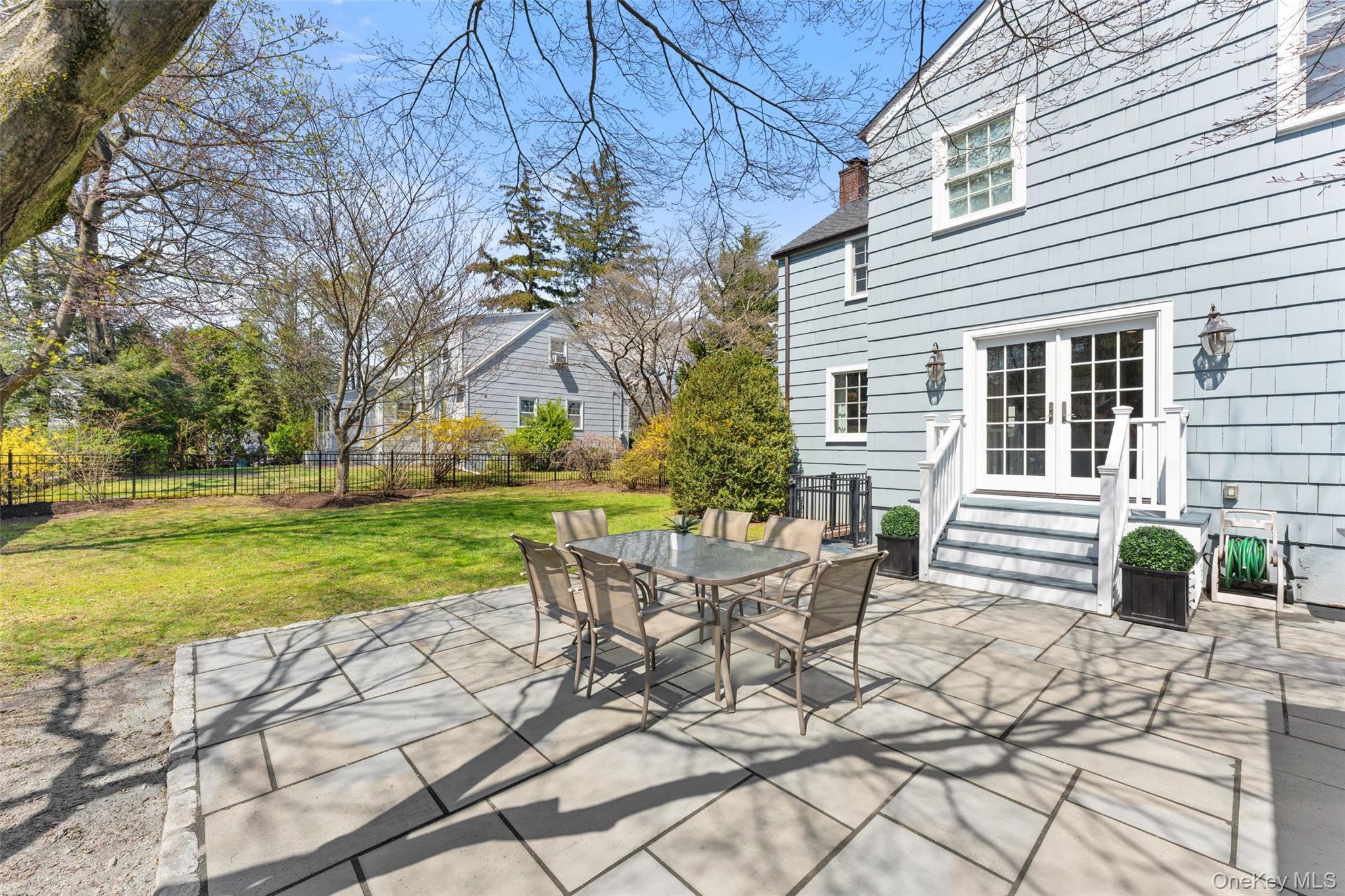 44 Sprague Road Scarsdale, NY 10583 - Photo 28 of 36 Enjoy the gorgeous patio accessed via french doors from the kitchen