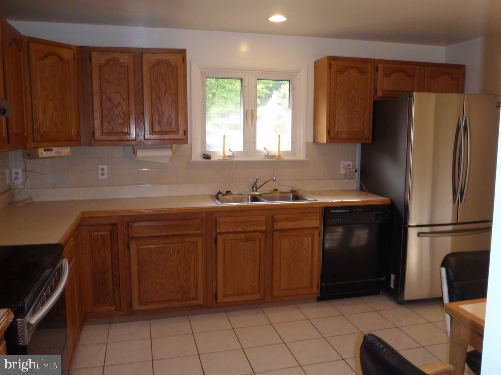 760 Gist Road Westminster, MD 21157 - Photo 6 of 28 Kitchen with new stove and refrigerator