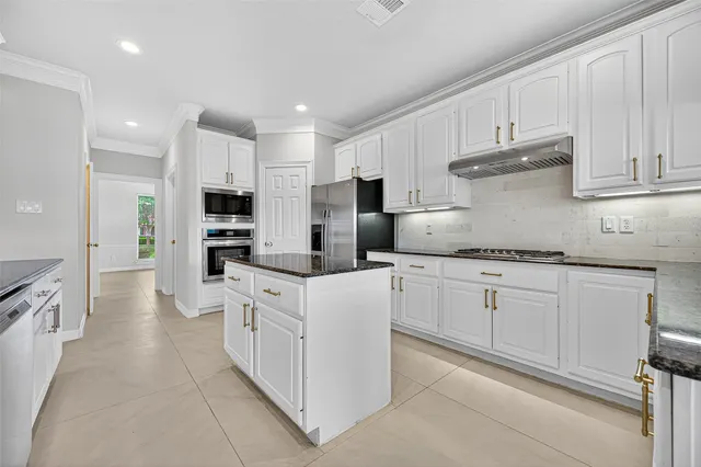 a view of livingroom with furniture and cabinet