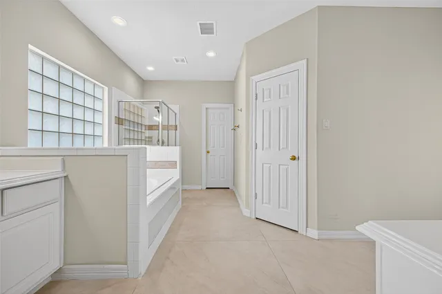 a view of a patio with a yard