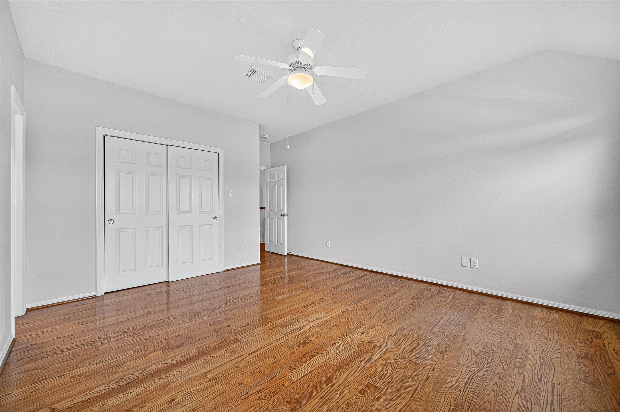 1902 Sparrows Ridge Katy, TX 77450 - Photo 29 of 48 a view of an empty room and wooden floor