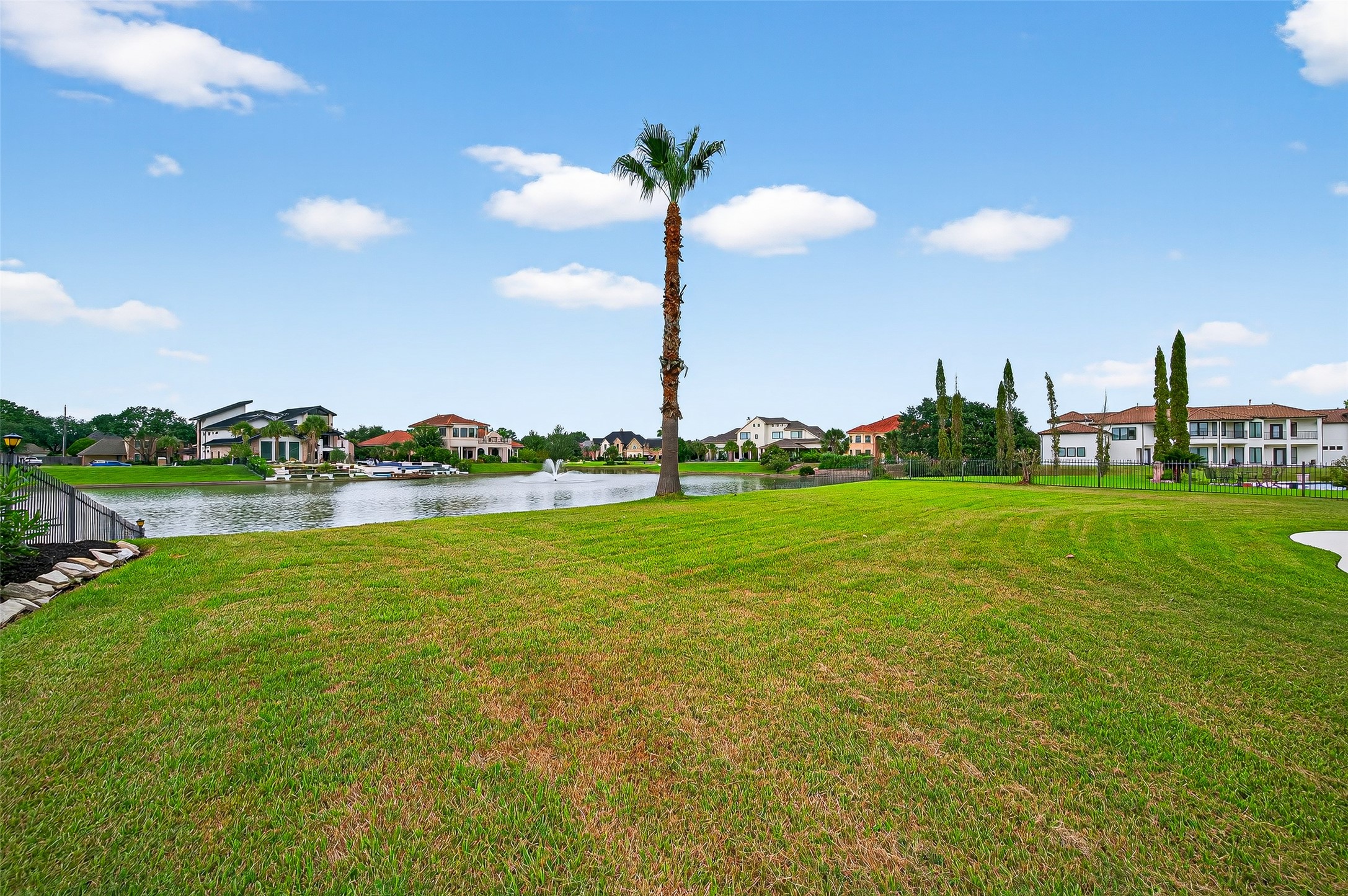 1902 Sparrows Ridge Katy, TX 77450 - Photo 36 of 48 a view of a garden with a lake
