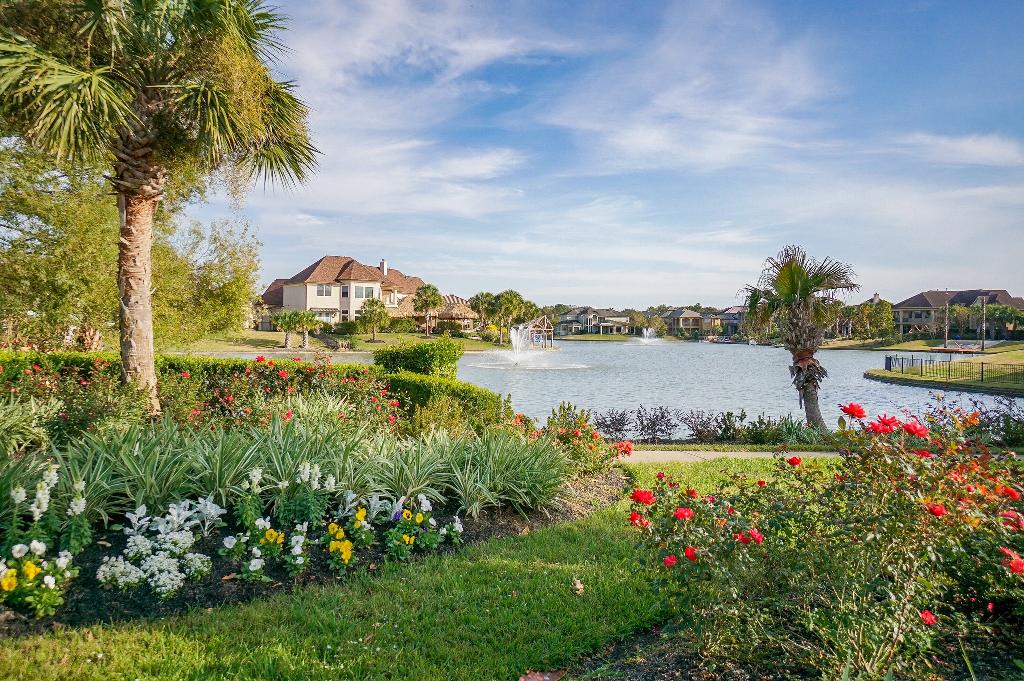 1902 Sparrows Ridge Katy, TX 77450 - Photo 43 of 48 a view of a lake with a big yard and large trees