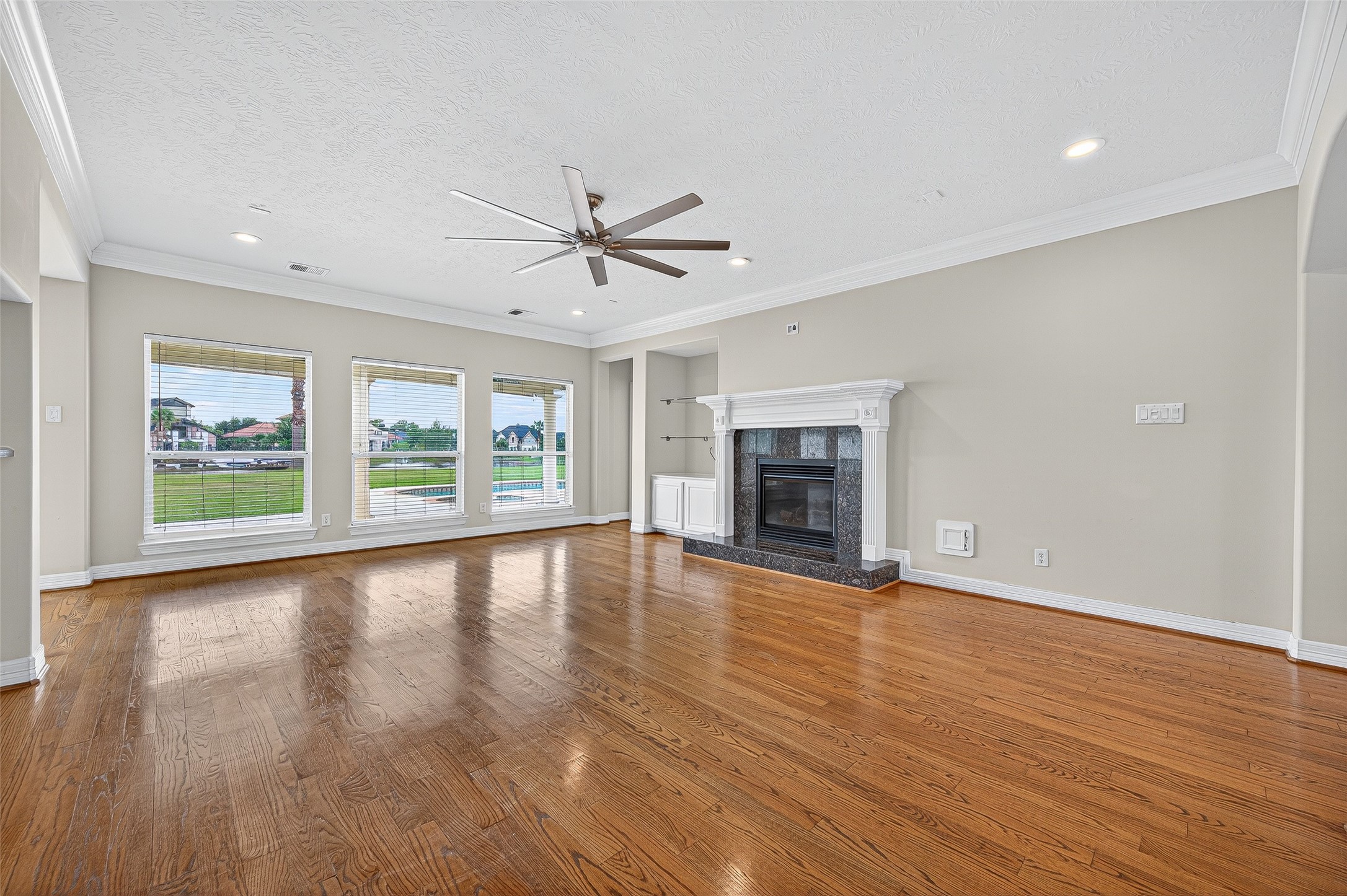 1902 Sparrows Ridge Katy, TX 77450 - Photo 48 of 48 Large family room featuring open floor plan with a gas log fireplace.