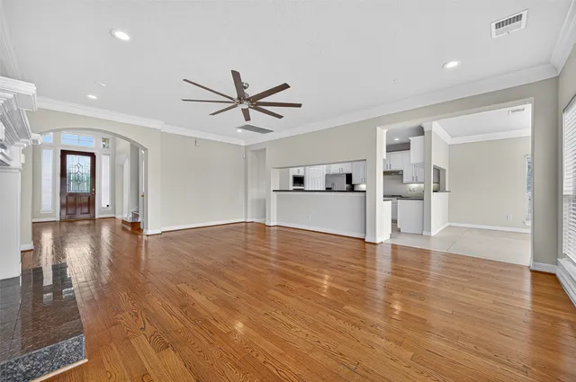 a view of an empty room with windows