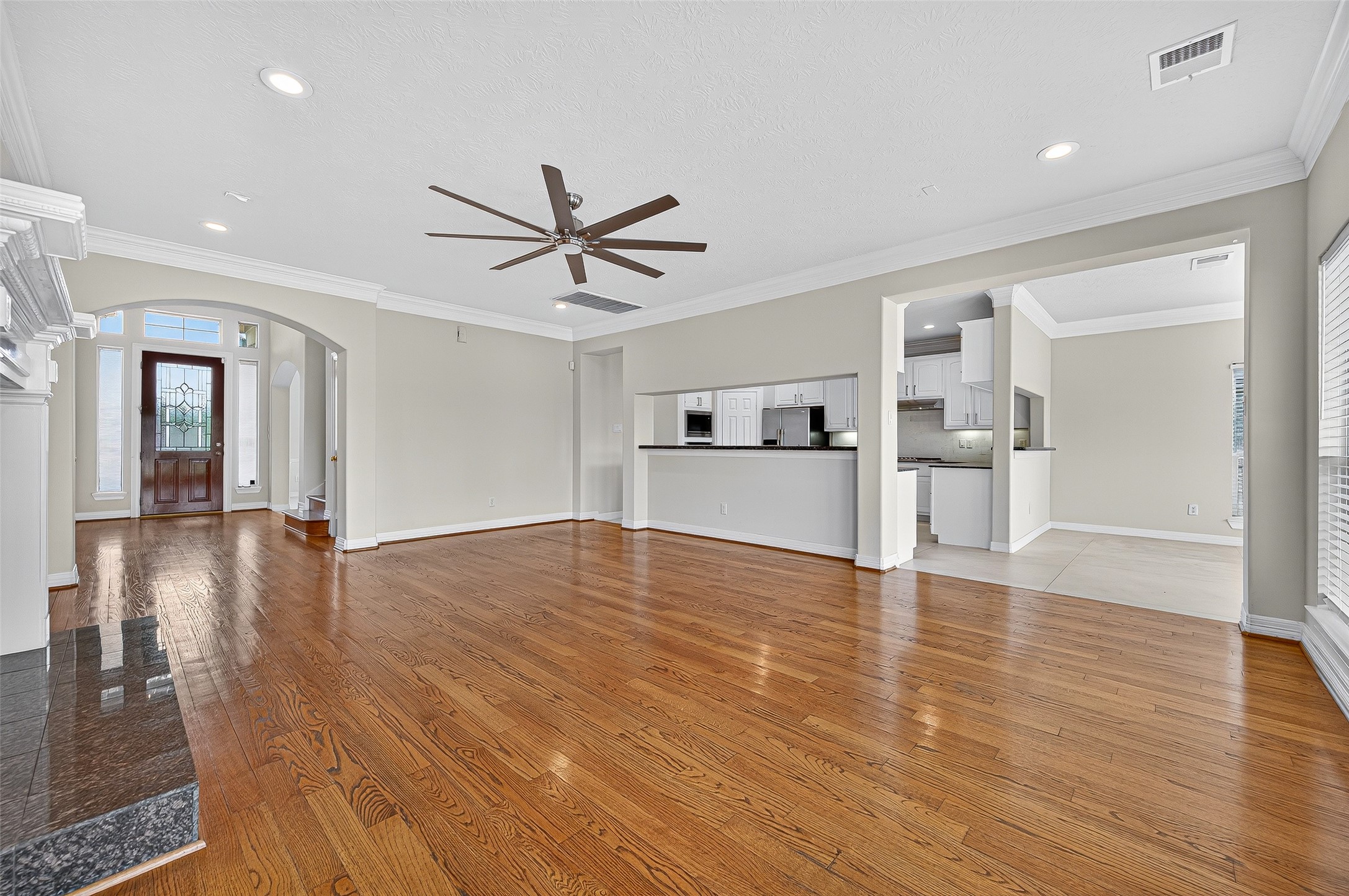 1902 Sparrows Ridge Katy, TX 77450 - Photo 7 of 48 Family room is open to kitchen and breakfast area.