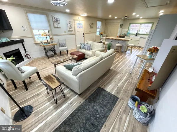 a living room with furniture and a table