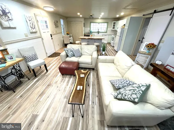a living room with furniture and a table