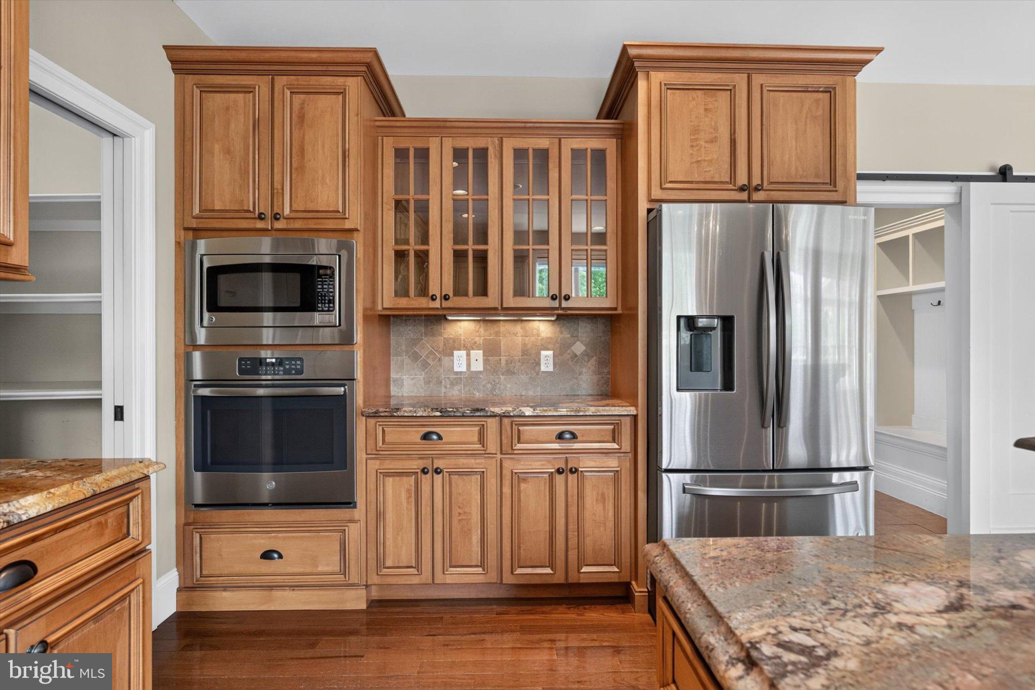 6505 Plowman Ridge Harrisburg, PA 17112 - Photo 20 of 83 Elegant kitchen with rich wood cabinetry.