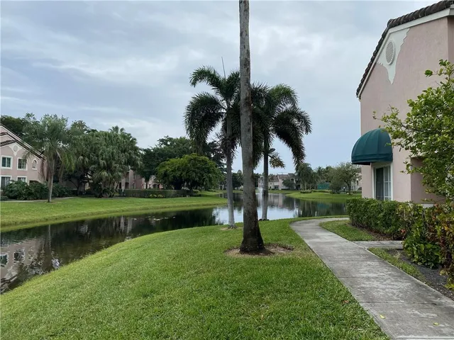 a house view with a garden space