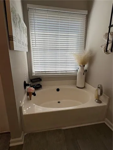 a bathroom with a sink and a bathtub