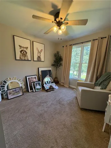 a view of a room with window and cabinet