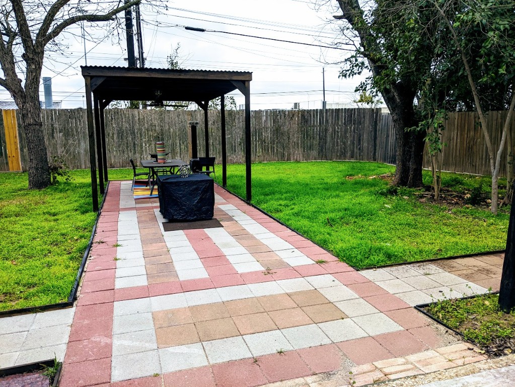3209 Barton View Drive, Unit A Austin, TX 78735 - Photo 13 of 14 Fenced backyard with a gazebo and a patio area