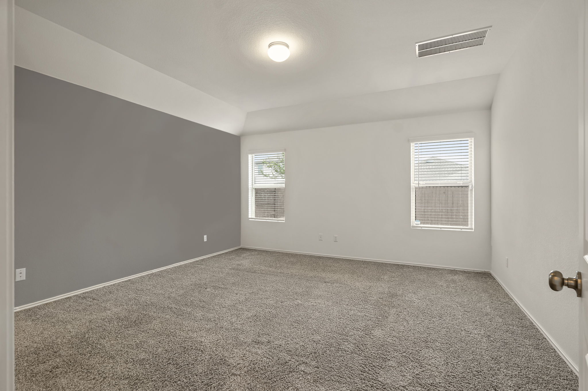 3489 Pauling Loop Round Rock, TX 78665 - Photo 15 of 32 The primary suite bedroom
