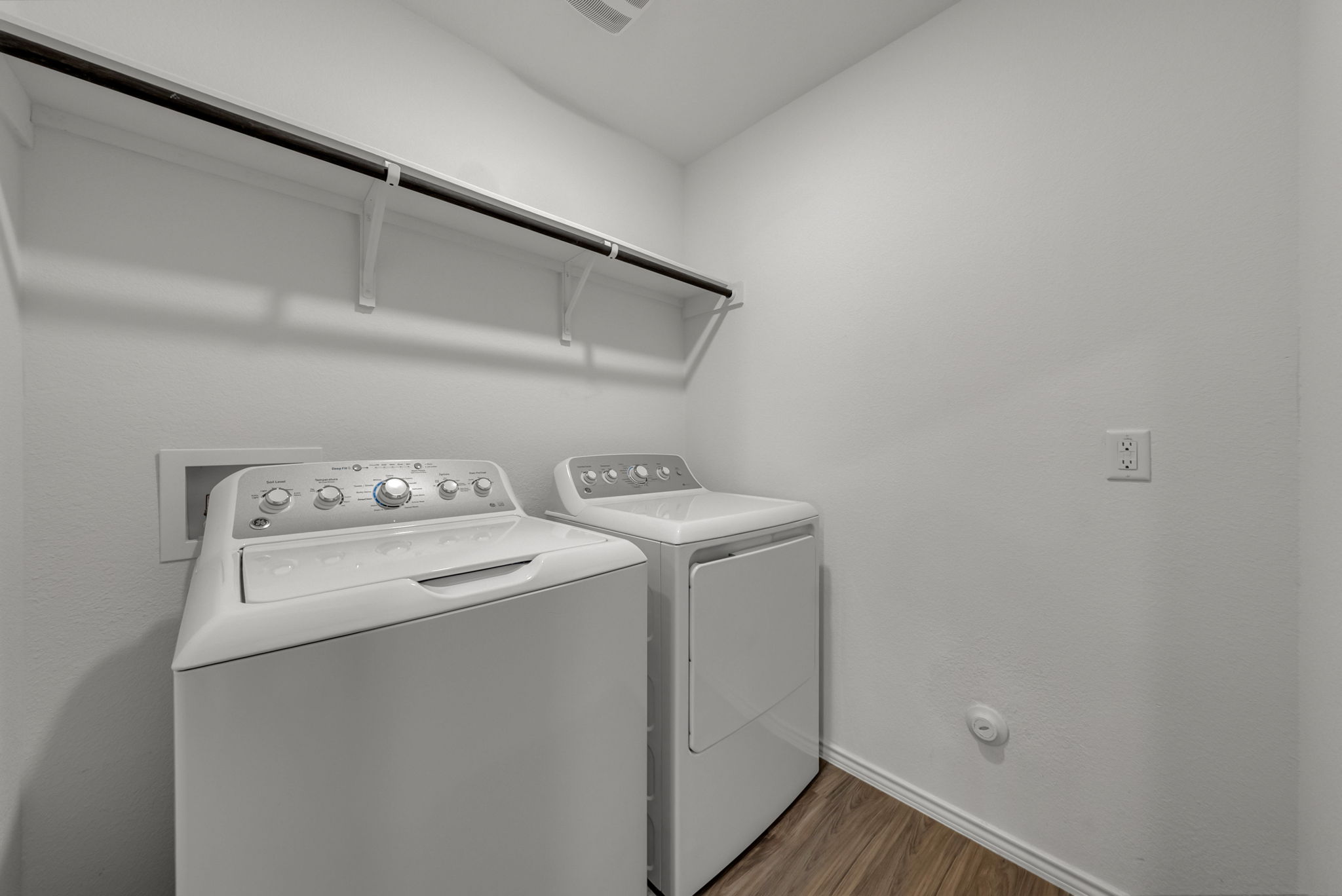 3489 Pauling Loop Round Rock, TX 78665 - Photo 16 of 32 Laundry Room in the Hallway & Washer / Dryer Convey