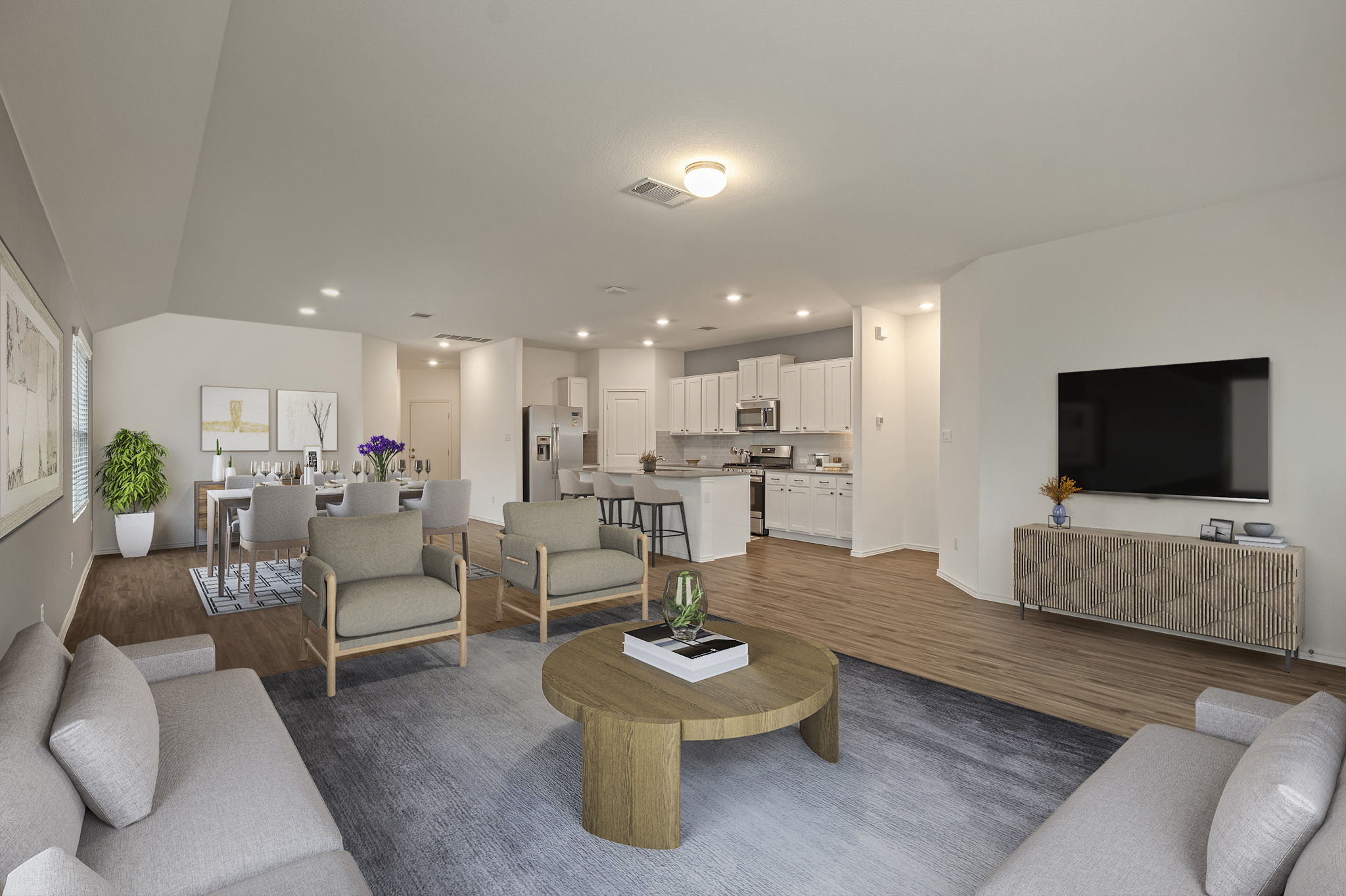 3489 Pauling Loop Round Rock, TX 78665 - Photo 32 of 32 This home's living room has vinyl wood floors for low maintenance living, and an open concept floor plan for entertaining.
