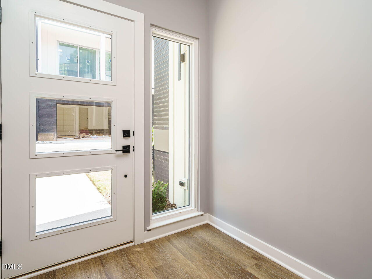 1525 Urban Trace Lane Raleigh, NC 27608 - Photo 9 of 32 003-1280x960-foyer